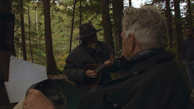 The Man with the Gray Elevated Hair